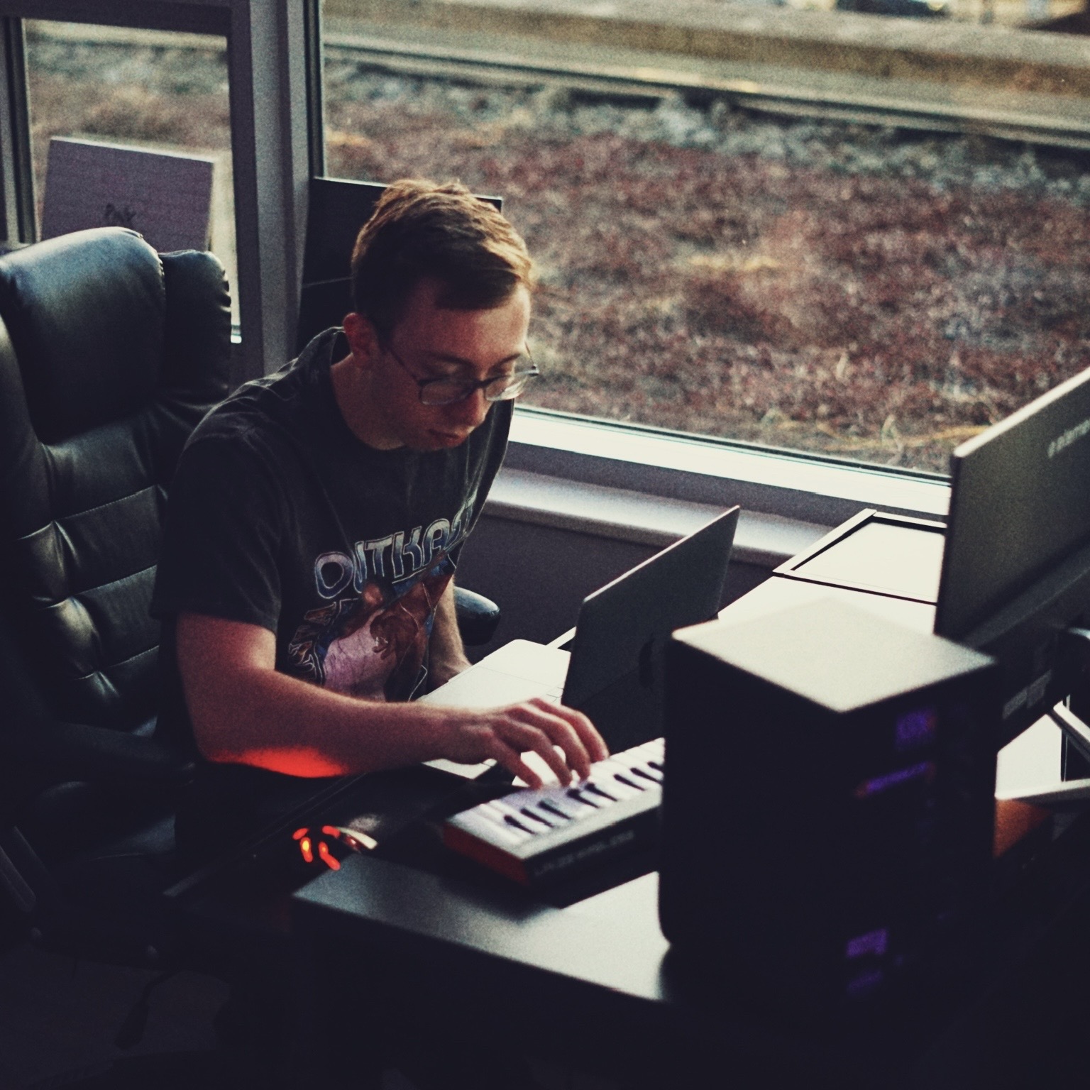 Brian Oliver producing music at a keyboard